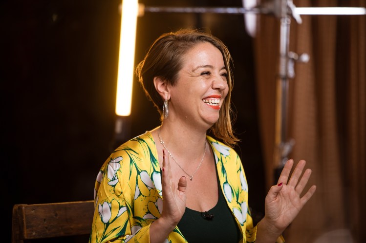 Natalie smiling during an interview